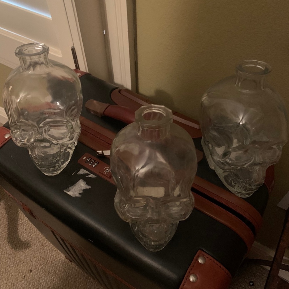 3 Glass collectible skull decanter bottles